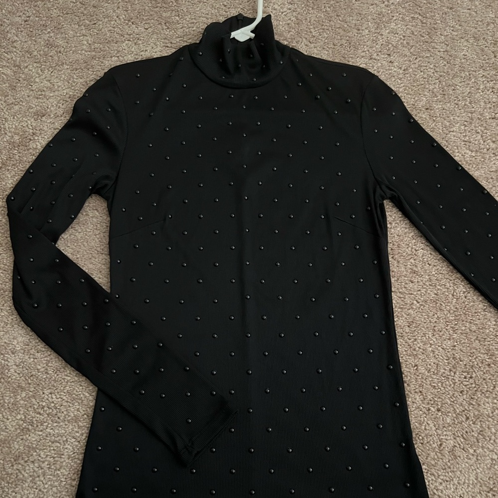H and M stud/beaded turtle neck. Beads in front and back. Size 12